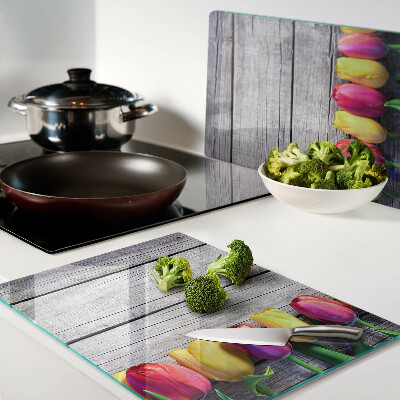 Chopping board Tulips on a wooden background