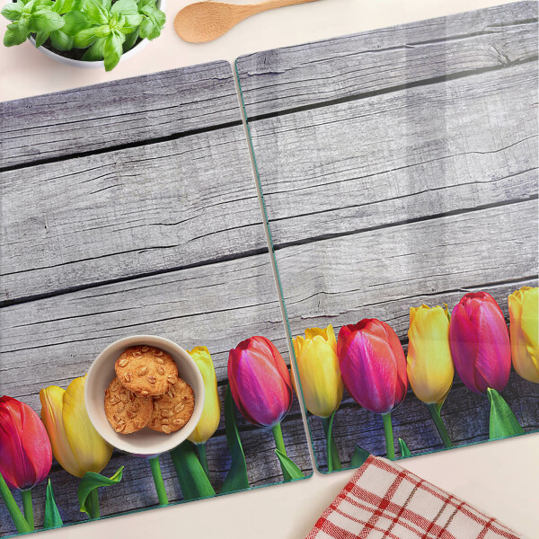 Chopping board Tulips on a wooden background