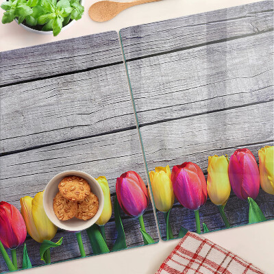 Chopping board Tulips on a wooden background