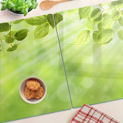 Glass chopping board Green leaves against the light