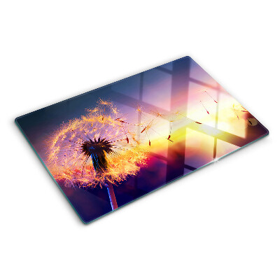 Chopping board Dandelions against the sunset background