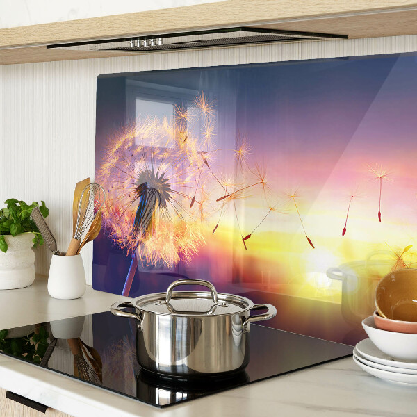 Chopping board Dandelions against the sunset background