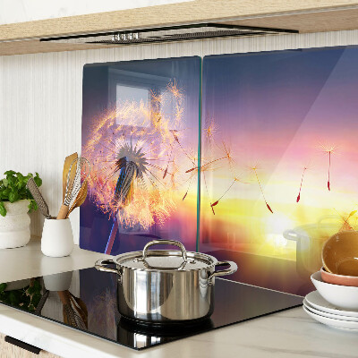 Chopping board Dandelions against the sunset background