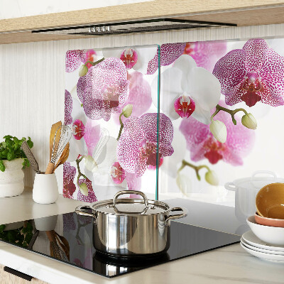 Chopping board glass Orchids in the background of the window