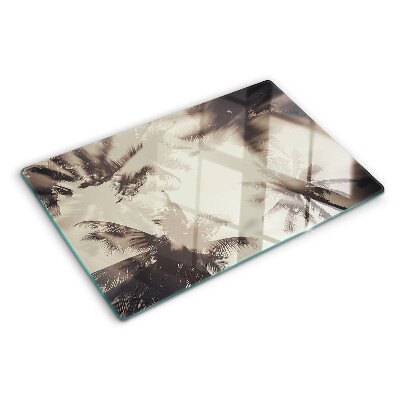 Glass kitchen board Palm trees on a monochrome background