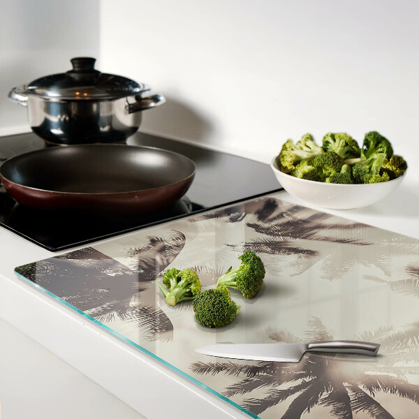 Glass kitchen board Palm trees on a monochrome background