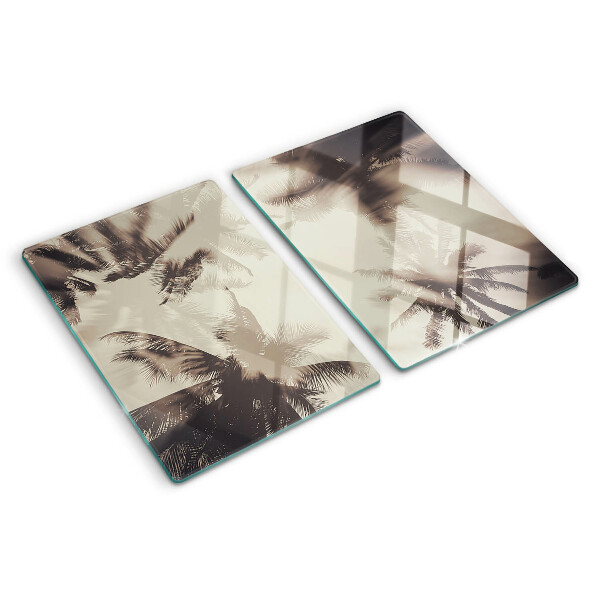 Glass kitchen board Palm trees on a monochrome background