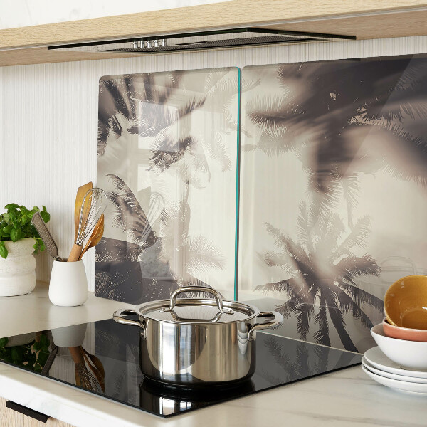 Glass kitchen board Palm trees on a monochrome background