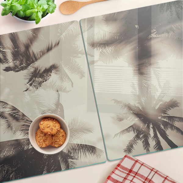 Glass kitchen board Palm trees on a monochrome background