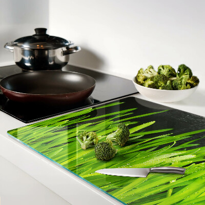 Chopping board glass Green grass with water drops