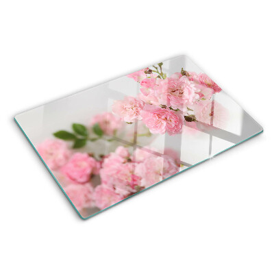 Glass cutting board Pink flowers in a vase