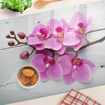 Chopping board Orchids on a white background