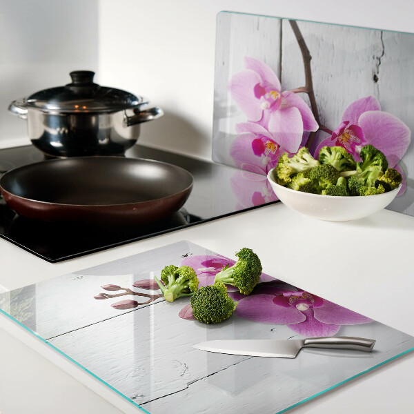 Chopping board Orchids on a white background