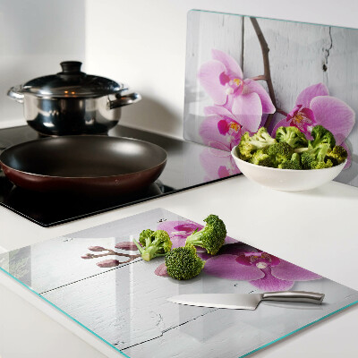 Chopping board Orchids on a white background