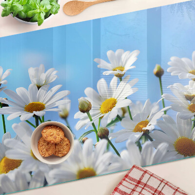 Glass chopping board Daisy flowers on a blue background