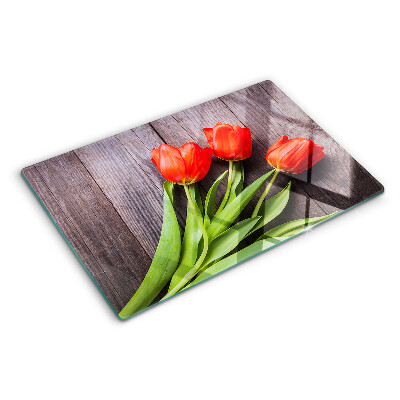 Chopping board Tulips on a wooden background