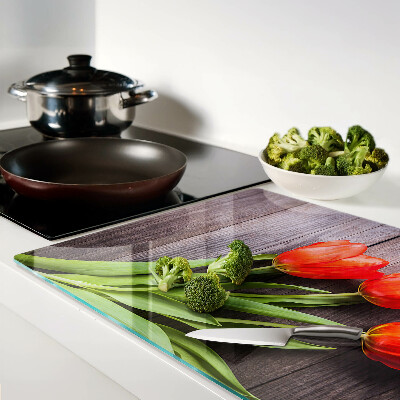Chopping board Tulips on a wooden background
