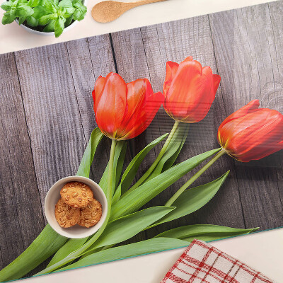 Chopping board Tulips on a wooden background