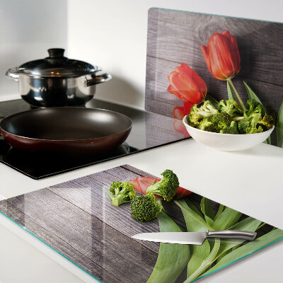 Chopping board Tulips on a wooden background