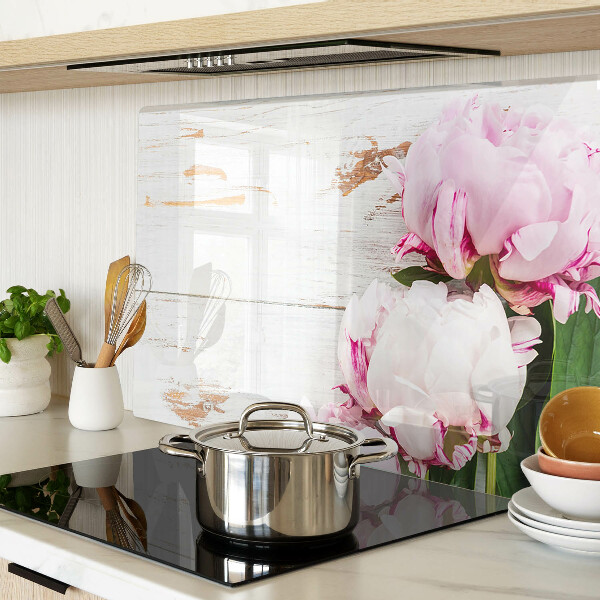 Glass cutting board Peony flowers on a wood background