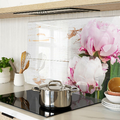 Glass cutting board Peony flowers on a wood background