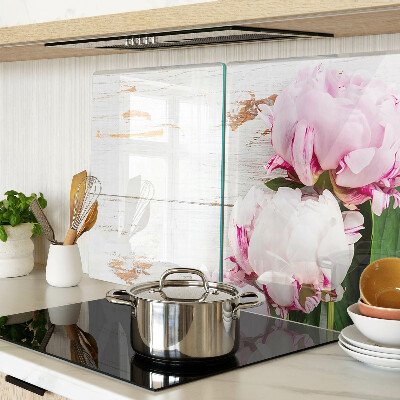 Glass cutting board Peony flowers on a wood background