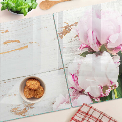 Glass cutting board Peony flowers on a wood background