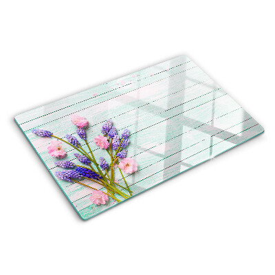 Chopping board Flowers on a wooden background