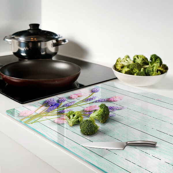 Chopping board Flowers on a wooden background