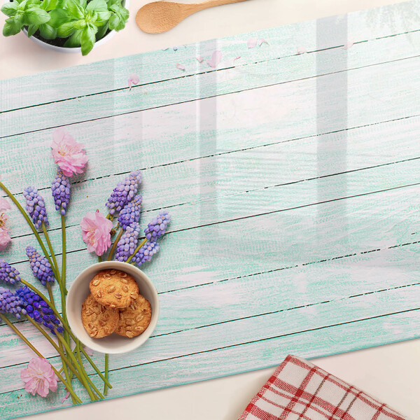 Chopping board Flowers on a wooden background