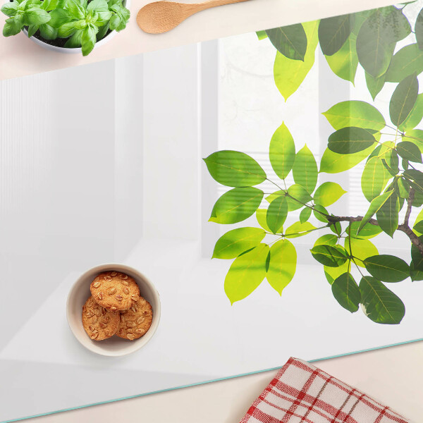 Cutting board Leaves against a bright sky