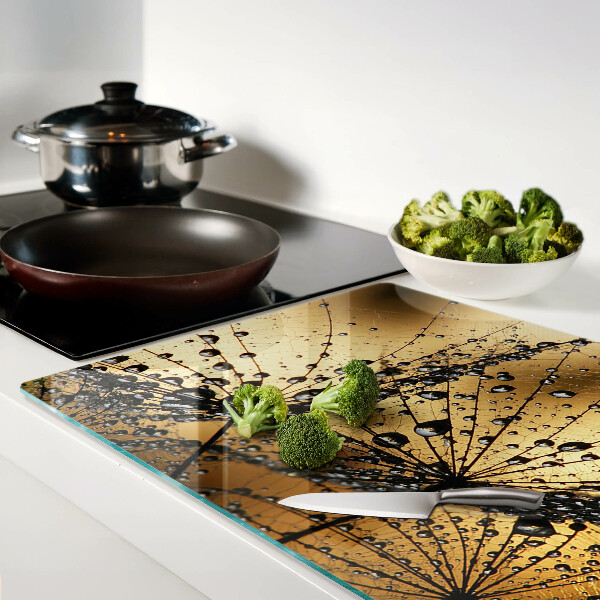 Glass cutting board Water drops on the leaves