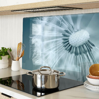 Chopping board glass Dandelions against the sky