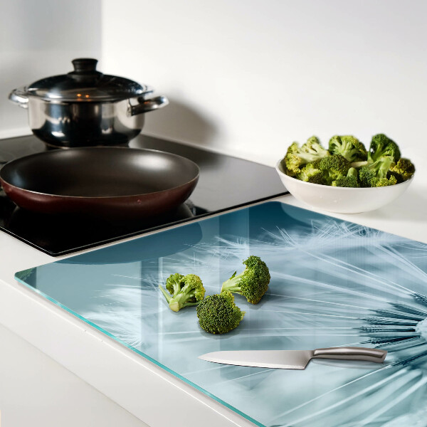 Chopping board glass Dandelions against the sky
