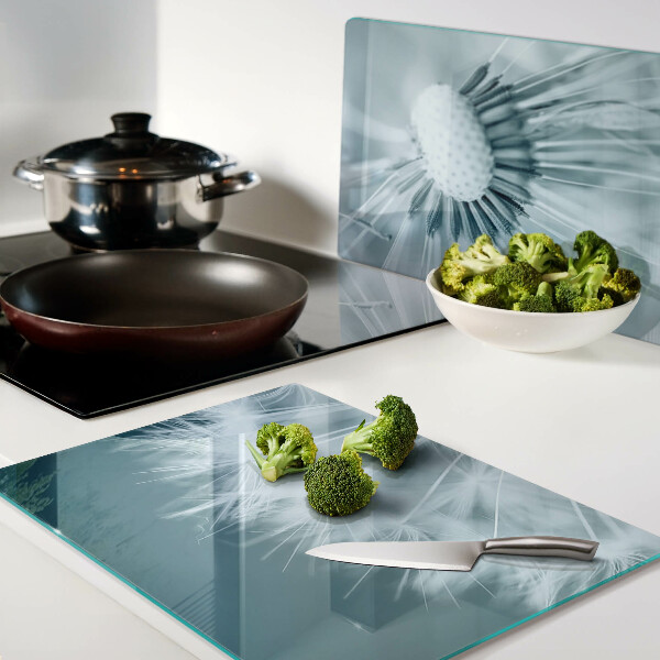 Chopping board glass Dandelions against the sky