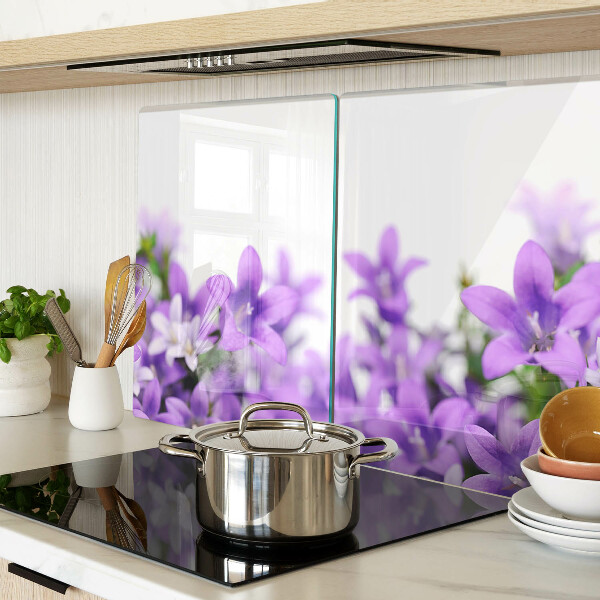 Glass cutting board Purple flowers in the background