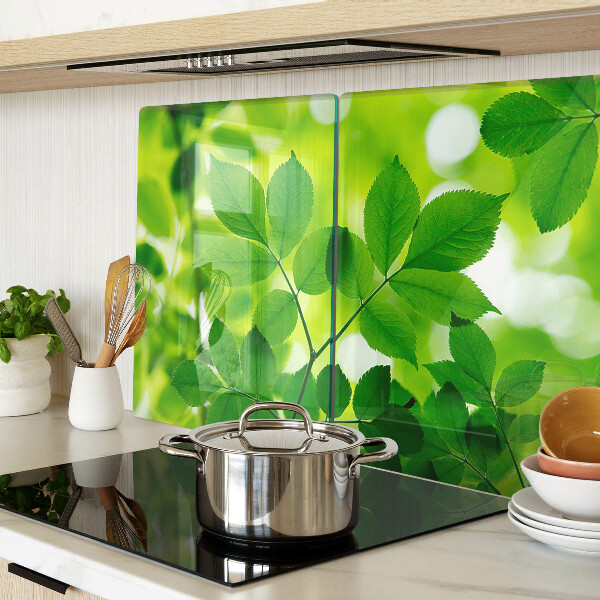 Cutting board Leaves on a green background