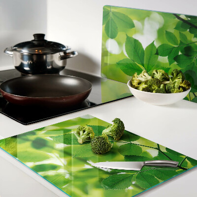 Cutting board Leaves on a green background