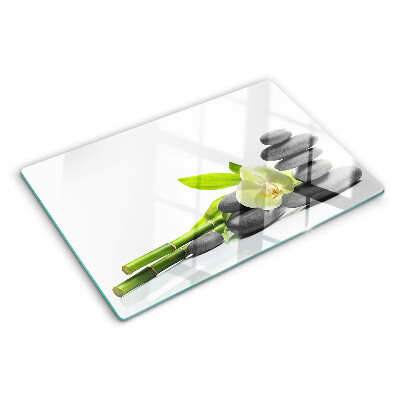 Glass kitchen board Orchid and spa stones