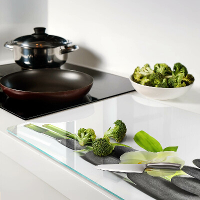 Glass kitchen board Orchid and spa stones