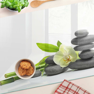 Glass kitchen board Orchid and spa stones