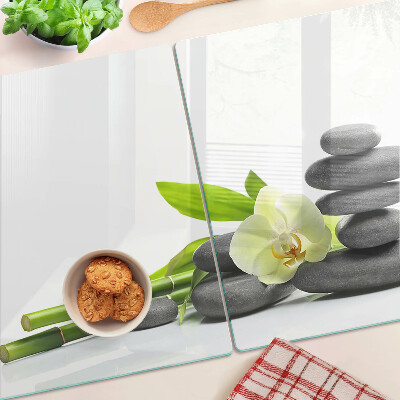 Glass kitchen board Orchid and spa stones