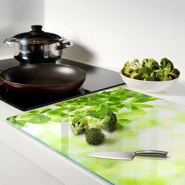 Chopping board glass Green leaves in the light