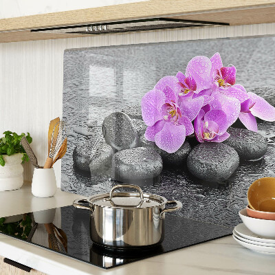 Cutting board Flowers and stones against the water background