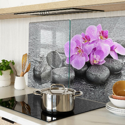 Cutting board Flowers and stones against the water background
