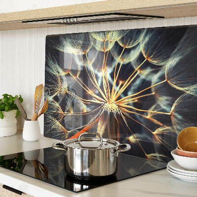 Chopping board glass Dandelions in macro photography