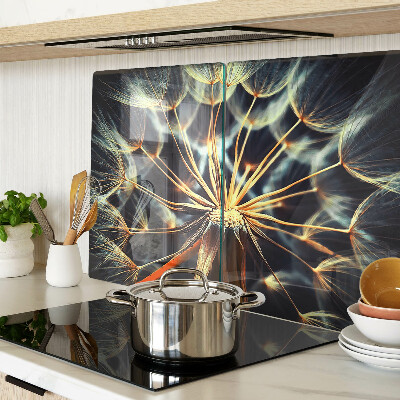 Chopping board glass Dandelions in macro photography