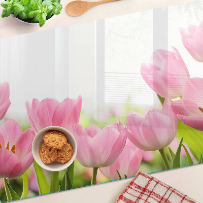 Glass kitchen board Pink tulips in the garden