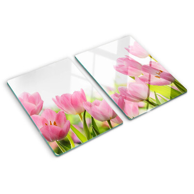 Glass kitchen board Pink tulips in the garden