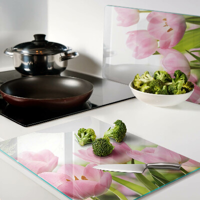 Glass kitchen board Pink tulips in the garden